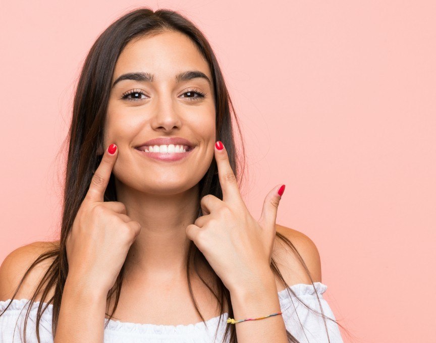 Woman with gorgeous smile after cosmetic dentistry