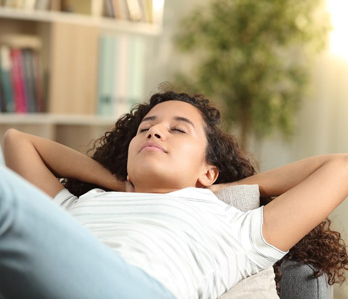 Woman resting on a couch