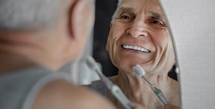 Man brushing teeth