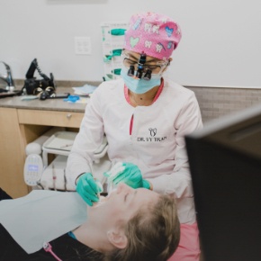 Dentist treating dental patient