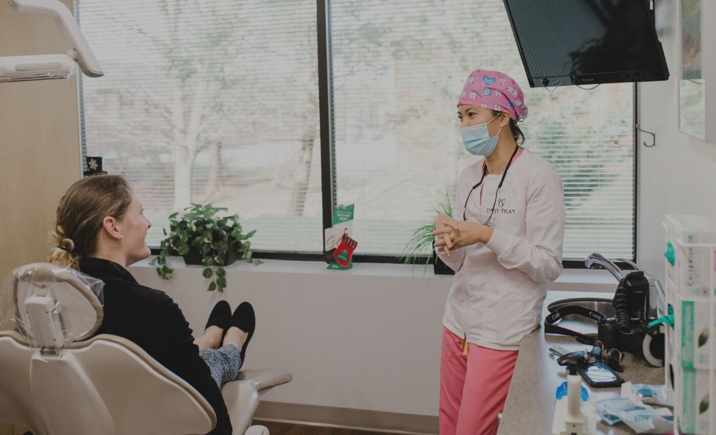 Millersville dentist talking to a dental patient