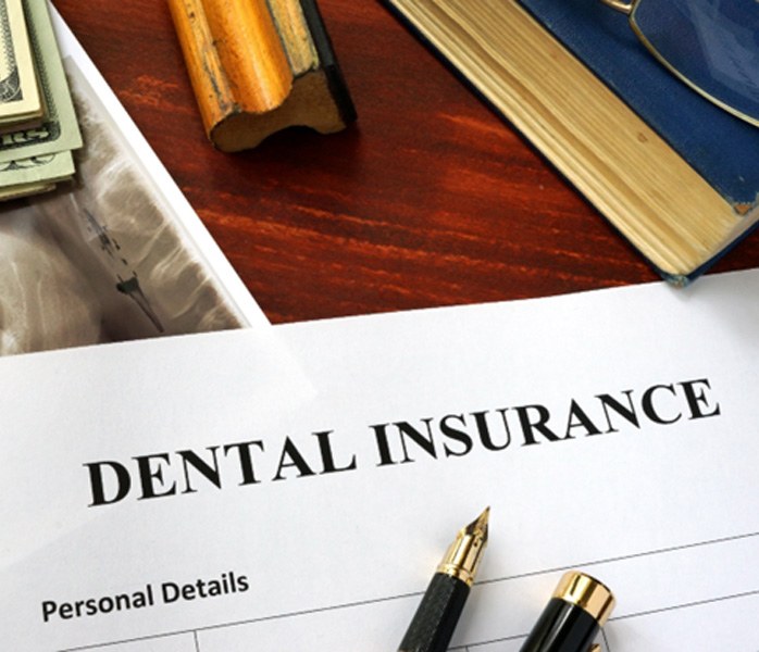 dental insurance form on table 