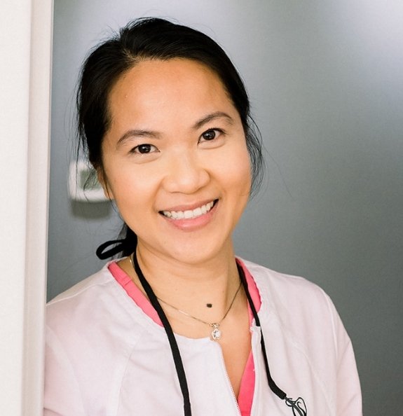 Doctor Tran smiling