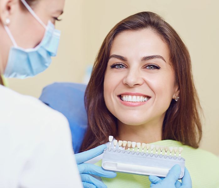 Woman's smile after metal free dental restorations