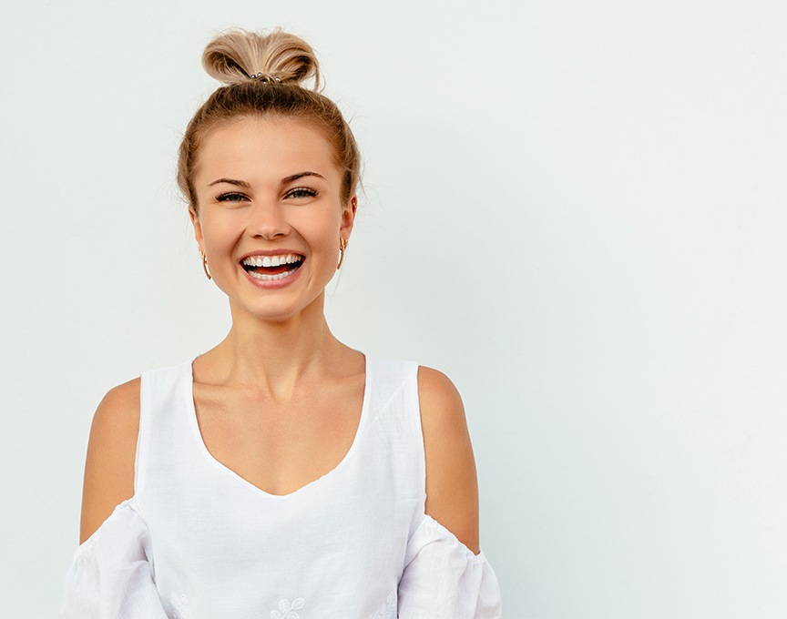 Woman with healthy smile after tooth colored fillings