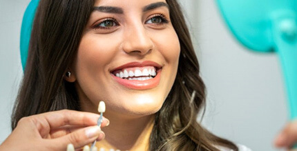 a patient undergoing the initial teeth whitening process