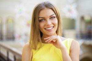 a young woman with a beautiful smile