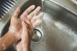 dentist near Severna Park washing their hands