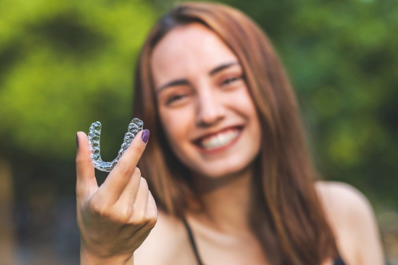 woman following her Invisalign wear time in Millersville